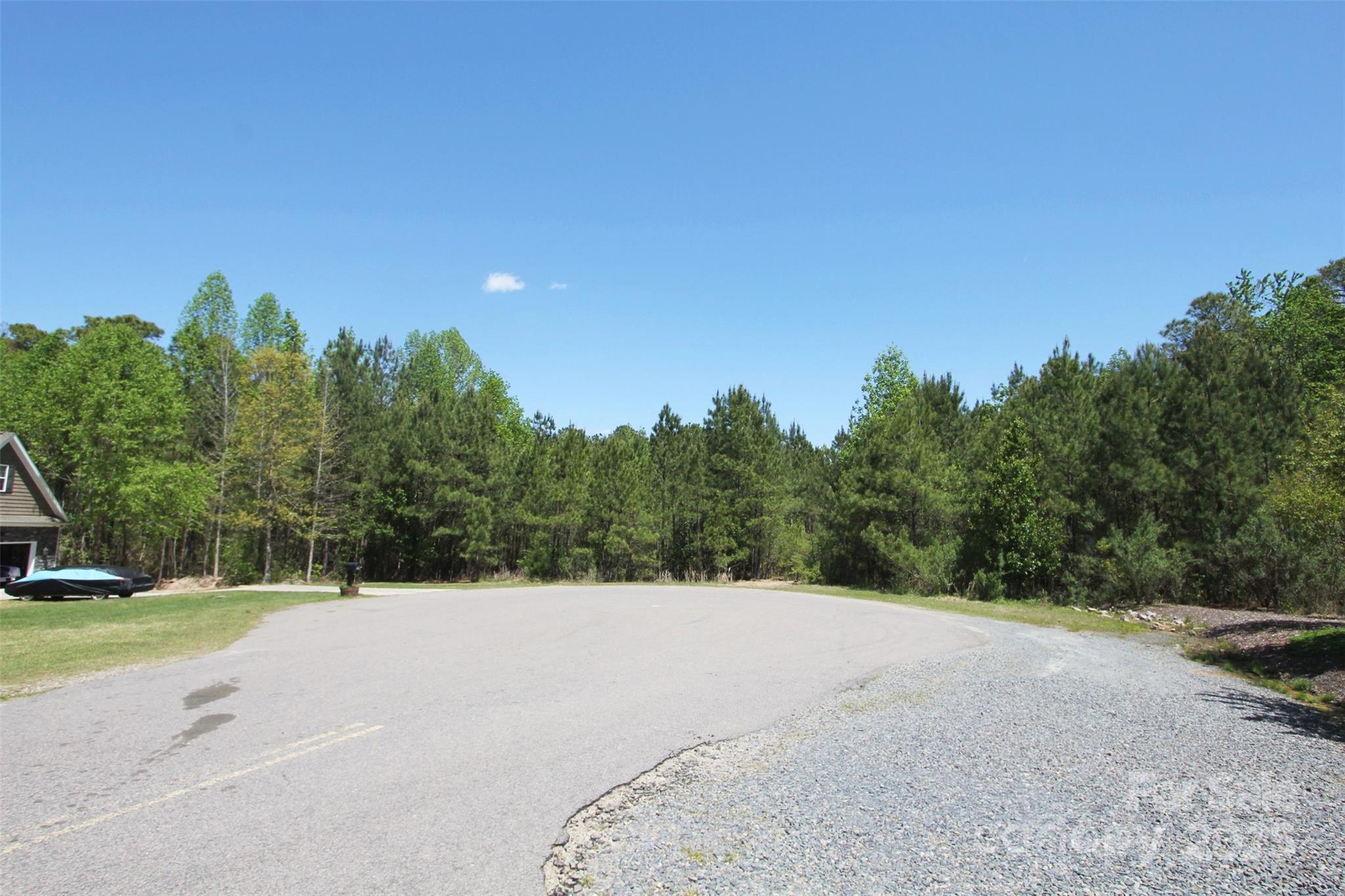 Tbd Queens Cove Way Carthage, NC 28327 - Photo 8 of 33 a view of a field with trees in the background