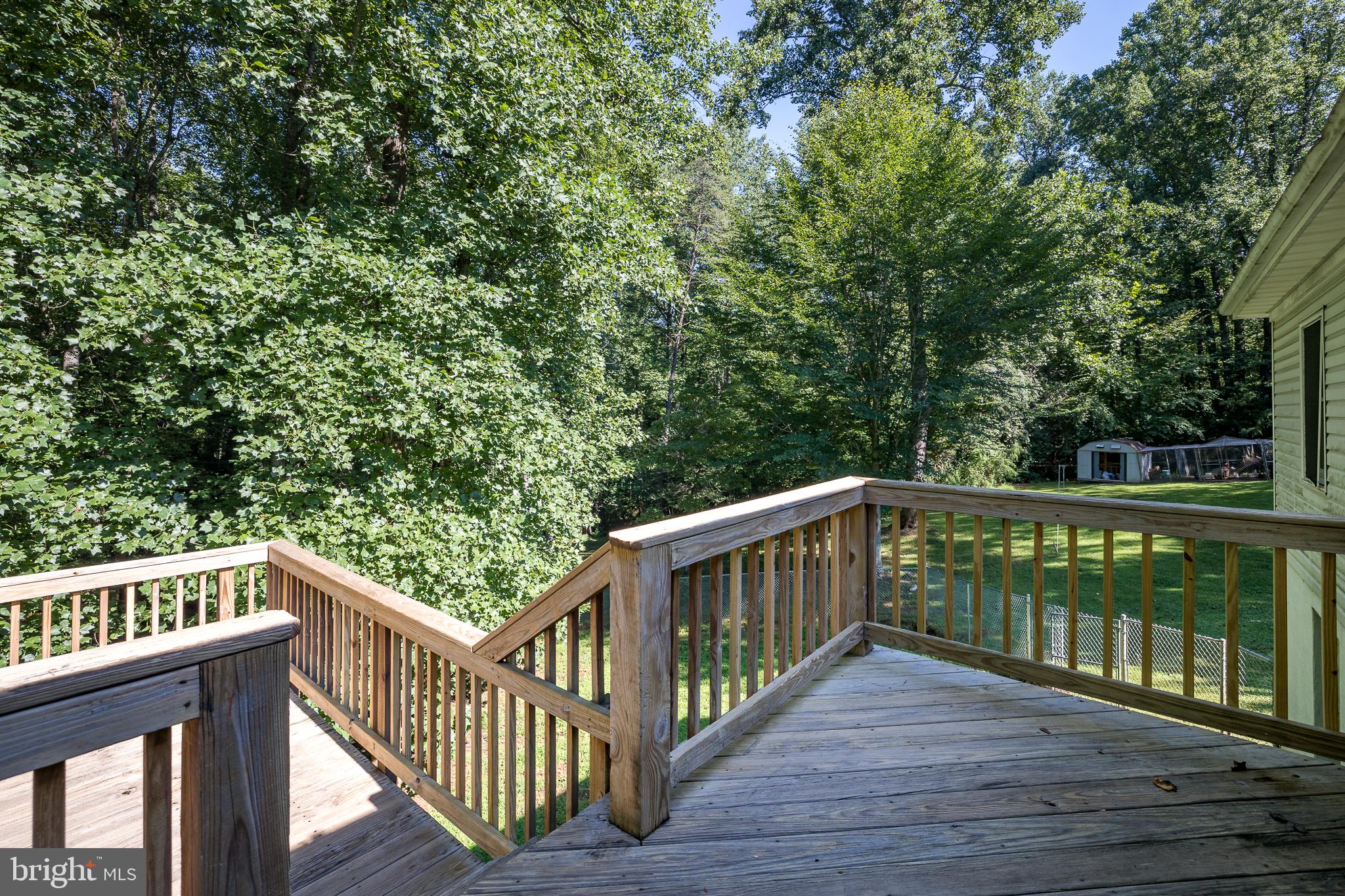 12521 Hazel River Road Rixeyville, VA 22737 - Photo 28 of 33 Deck-Stairs access fenced yard-