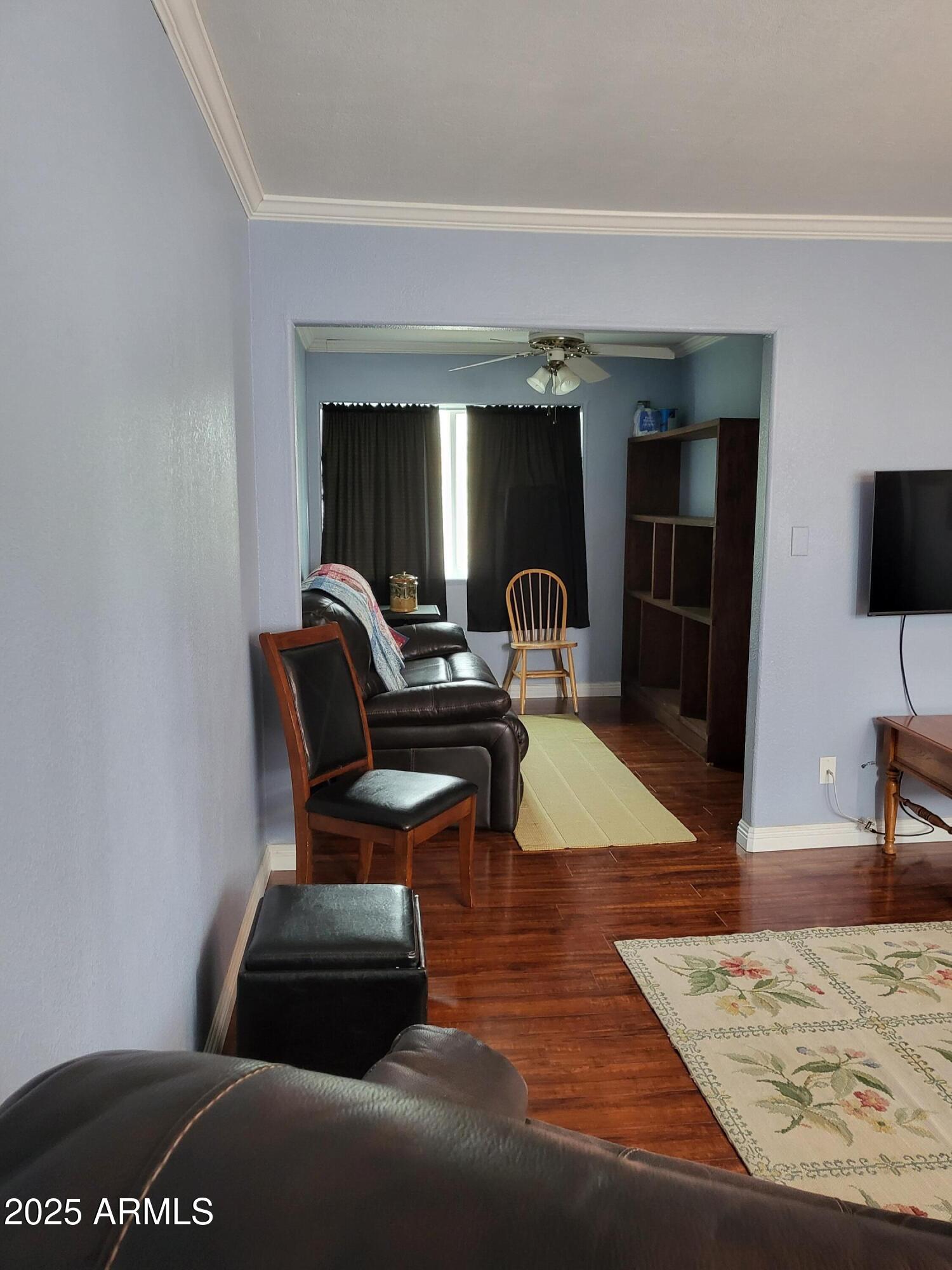 815 North Hayden Road, Unit D207 Scottsdale, AZ 85257 - Photo 7 of 29 a living room with furniture and a rug
