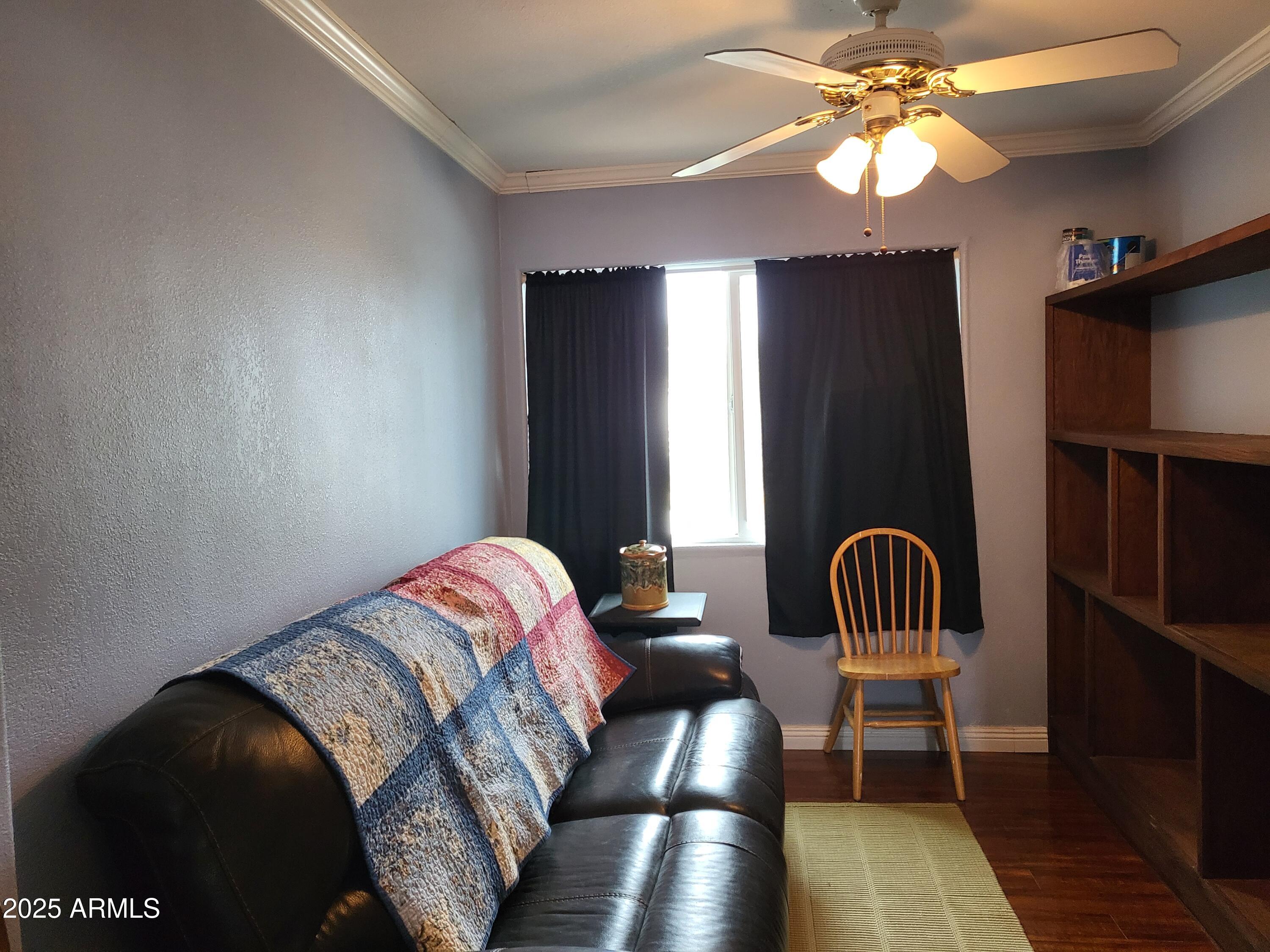 815 North Hayden Road, Unit D207 Scottsdale, AZ 85257 - Photo 8 of 29 a bedroom with furniture and a window