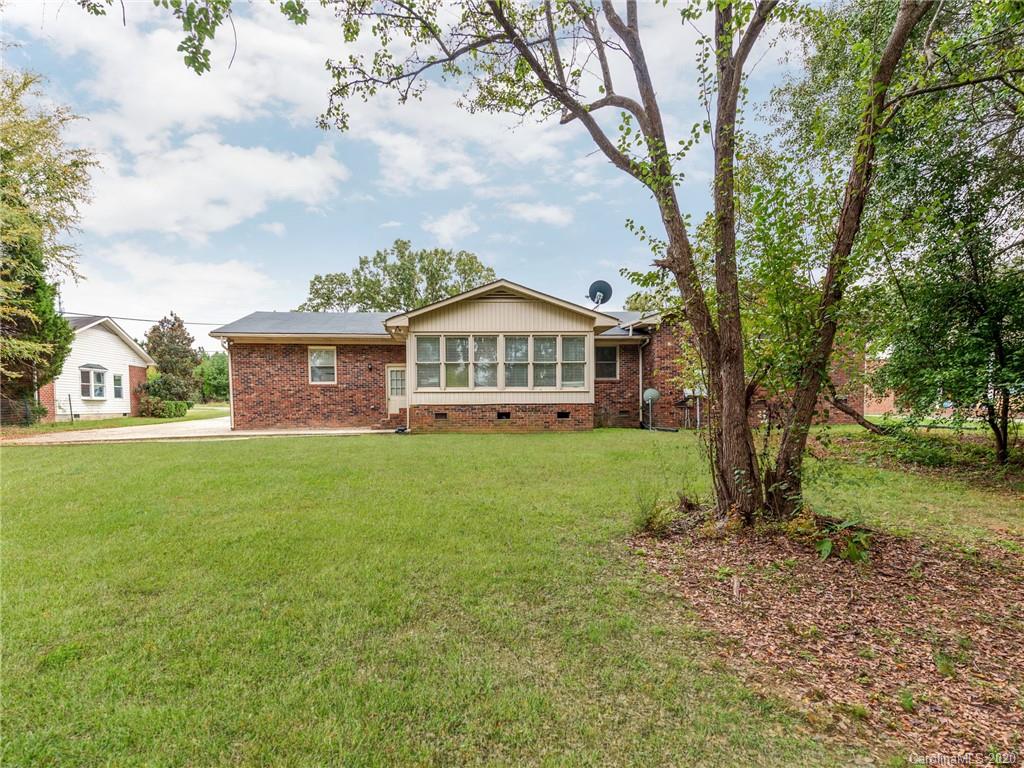 10128 Mt Holly Road Charlotte, NC 28214 - Photo 24 of 24 a view of an house with backyard and garden