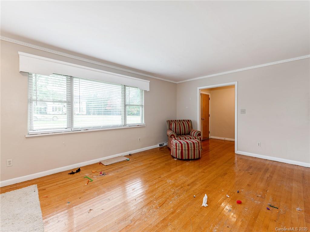 10128 Mt Holly Road Charlotte, NC 28214 - Photo 7 of 24 a room with a bed and a window