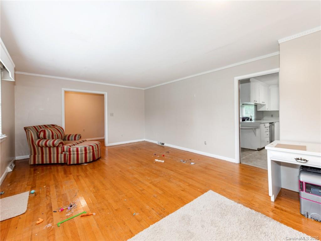 10128 Mt Holly Road Charlotte, NC 28214 - Photo 8 of 24 a living room with furniture and wooden floor