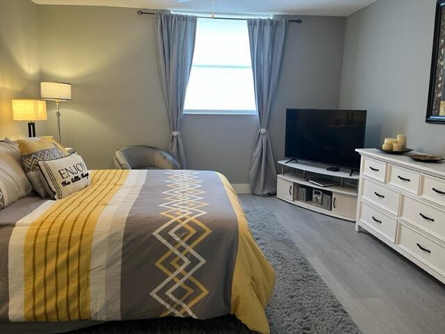 6461 Northwest 2nd Avenue, Unit 409 Boca Raton, FL 33487 - Photo 19 of 57 Master bedroom