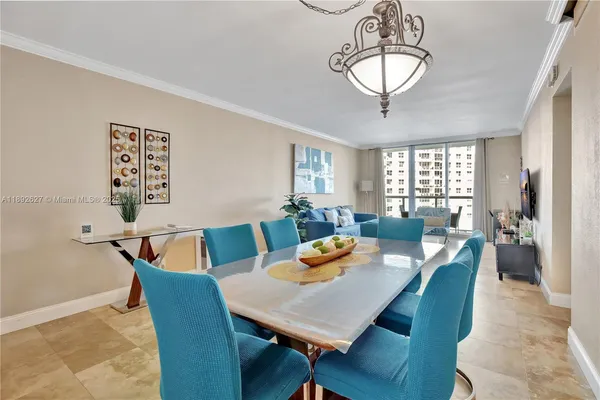 a view of a dining room with furniture window and outside view
