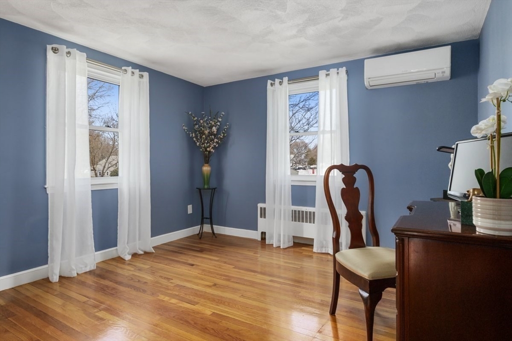 47 Irving Drive Walpole, MA 02081 - Photo 18 of 42 a view of a workspace with furniture and a window