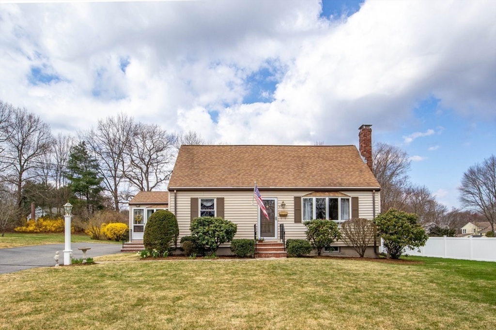 47 Irving Drive Walpole, MA 02081 - Photo 2 of 42 a front view of a house with a yard