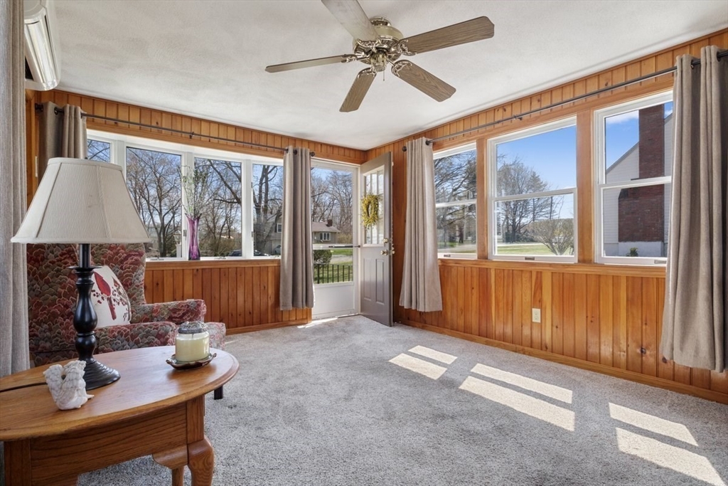 47 Irving Drive Walpole, MA 02081 - Photo 21 of 42 a living room with furniture and a window