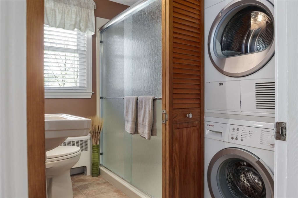 47 Irving Drive Walpole, MA 02081 - Photo 24 of 42 a bathroom with a toilet and a sink