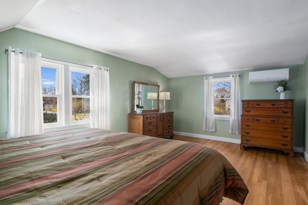 47 Irving Drive Walpole, MA 02081 - Photo 26 of 42 a bedroom with a bed and furniture