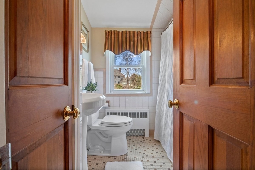 47 Irving Drive Walpole, MA 02081 - Photo 33 of 42 a bathroom with a sink toilet and shower