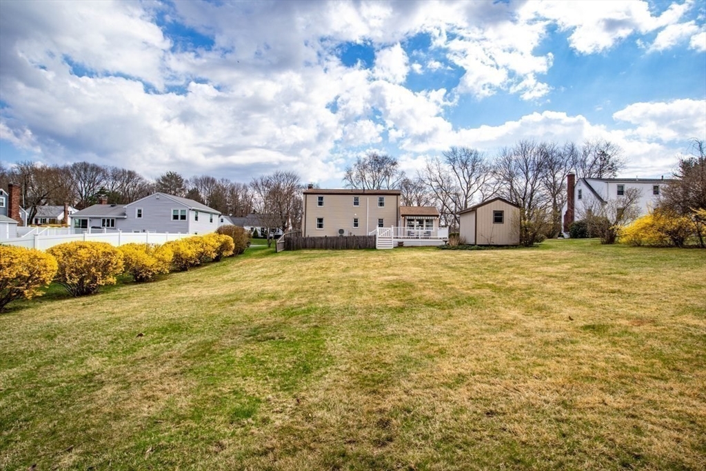 47 Irving Drive Walpole, MA 02081 - Photo 40 of 42 a view of a large body of water with water fountain in front of it