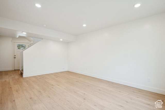 1615 North Angel Street, Unit E Layton, UT 84041 - Photo 17 of 42 Below grade area with light wood-style flooring, recessed lighting, and stairs