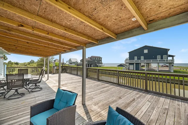 a patio with table and chairs