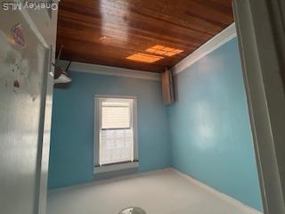 62-53 80th Road Queens, NY 11385 - Photo 9 of 11 Spare room featuring hardwood / wood-style floors and baseboards