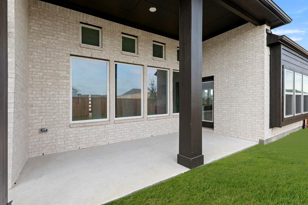 1013 Butterfly Lane Justin, TX 76247 - Photo 24 of 34 1013-butterfly-ln-justin-tx-covered-back-patio