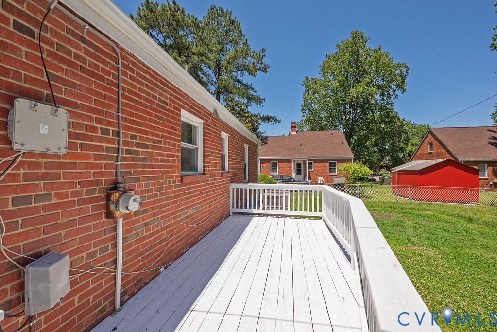 3400 Ryburn Road Richmond, VA 23234 - Photo 32 of 45 Expansive wood deck with white painted railing