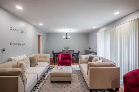 a living room with furniture and a couch