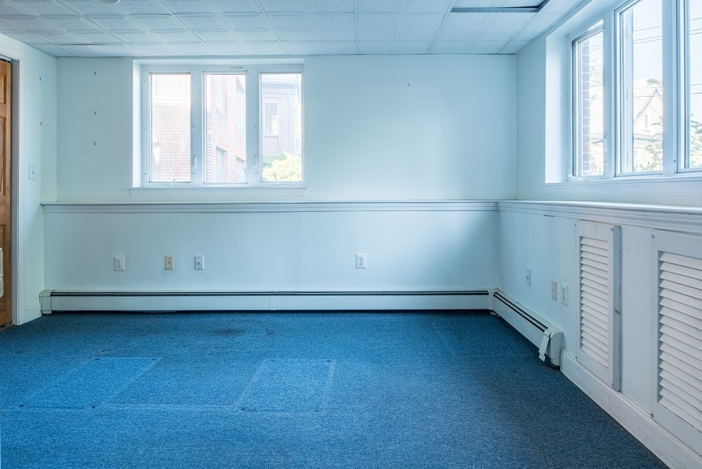 78 Winthrop Road Brookline, MA 02445 - Photo 13 of 14 an empty room with a window