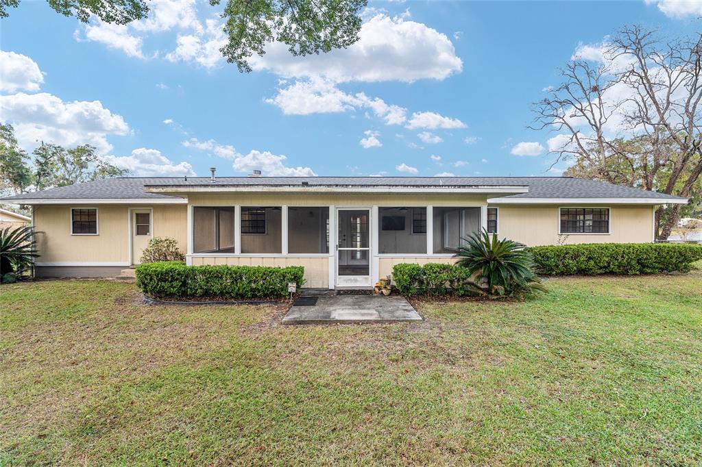 3300 Southeast 32nd Street Ocala, FL 34471 - Photo 40 of 51 front view of house with a yard