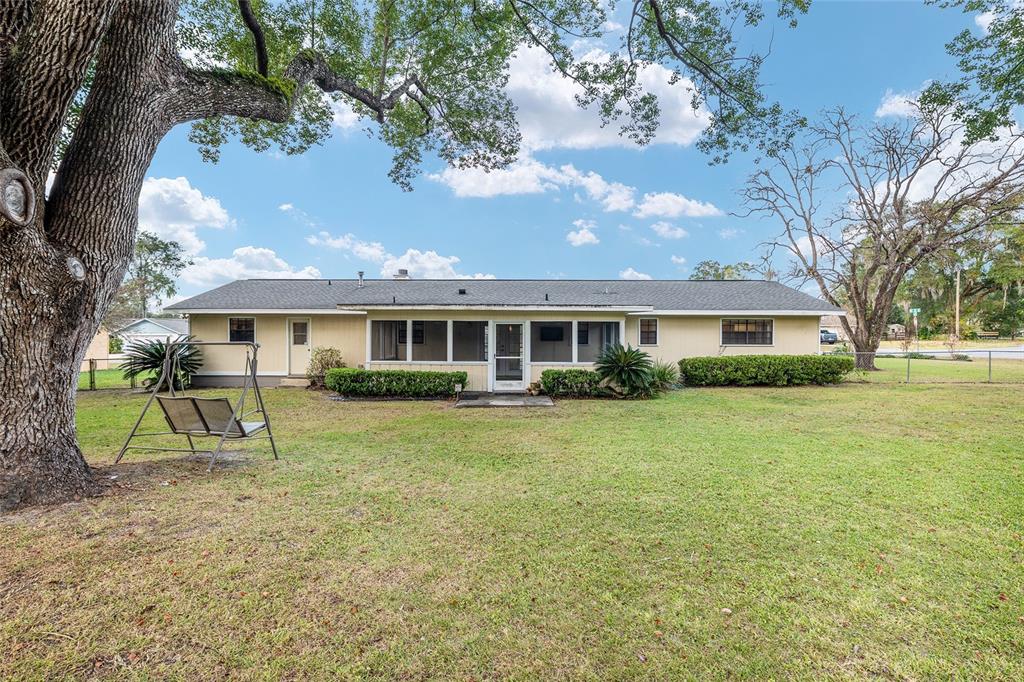 3300 Southeast 32nd Street Ocala, FL 34471 - Photo 42 of 51 a view of a house with a yard