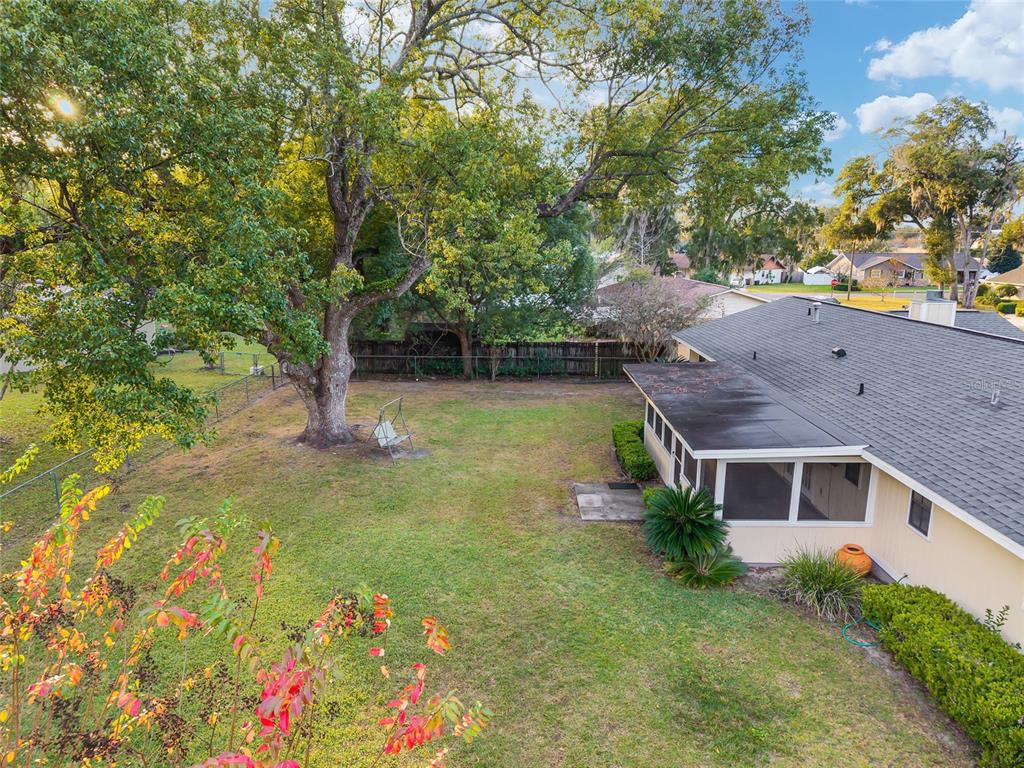 3300 Southeast 32nd Street Ocala, FL 34471 - Photo 46 of 51 a view of a house with a yard