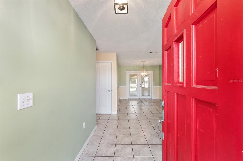3300 Southeast 32nd Street Ocala, FL 34471 - Photo 5 of 51 a hallway with a window