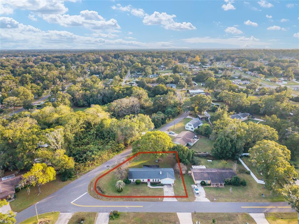 3300 Southeast 32nd Street Ocala, FL 34471 - Photo 51 of 51 an aerial view of residential houses with outdoor space
