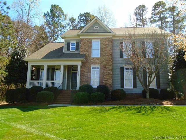 1512 Calvin Hall Road, Unit 161 Lake Wylie, SC 29710 - Photo 1 of 24 a front view of a house with a yard