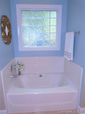1512 Calvin Hall Road, Unit 161 Lake Wylie, SC 29710 - Photo 14 of 24 a bathroom with a bathtub