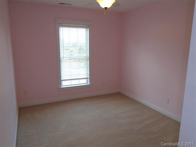 1512 Calvin Hall Road, Unit 161 Lake Wylie, SC 29710 - Photo 19 of 24 an empty room with a window