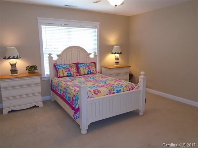 1512 Calvin Hall Road, Unit 161 Lake Wylie, SC 29710 - Photo 22 of 24 a bedroom with a bed and window