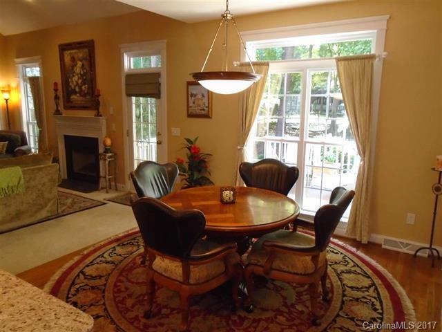 1512 Calvin Hall Road, Unit 161 Lake Wylie, SC 29710 - Photo 8 of 24 a dining room with furniture and window