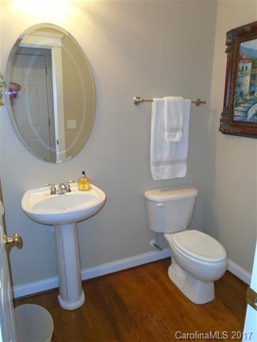 1512 Calvin Hall Road, Unit 161 Lake Wylie, SC 29710 - Photo 10 of 24 a bathroom with a sink toilet and mirror