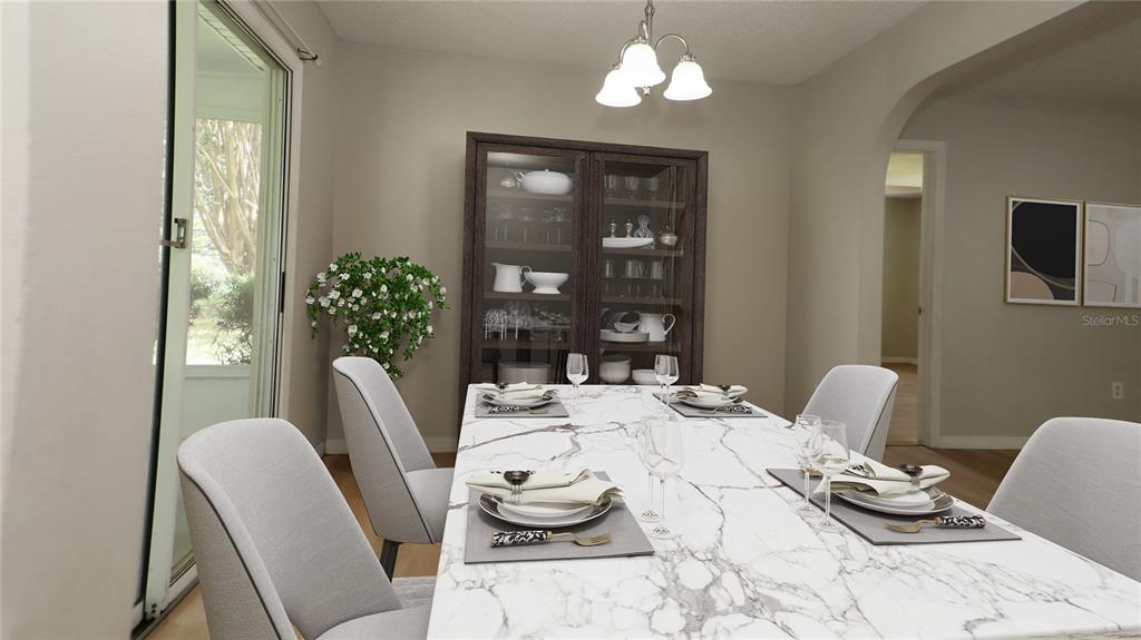 10860 Southwest 62nd Avenue Ocala, FL 34476 - Photo 15 of 35 a view of a dining room with furniture window and outside view