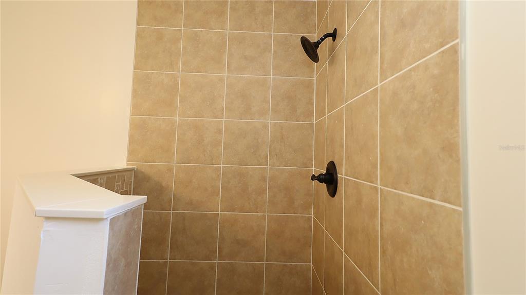 10860 Southwest 62nd Avenue Ocala, FL 34476 - Photo 34 of 35 a bathroom with a shower