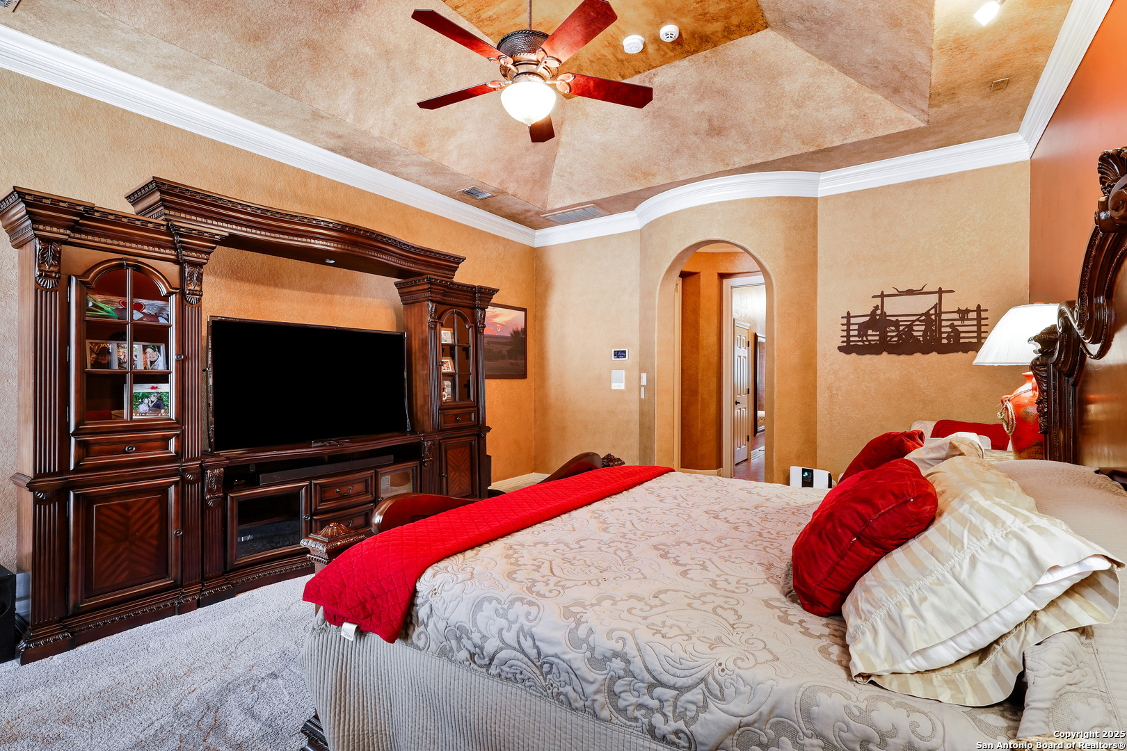 315 Santa Domingo Helotes, TX 78023 - Photo 21 of 50 a bedroom with a bed and a flat screen tv