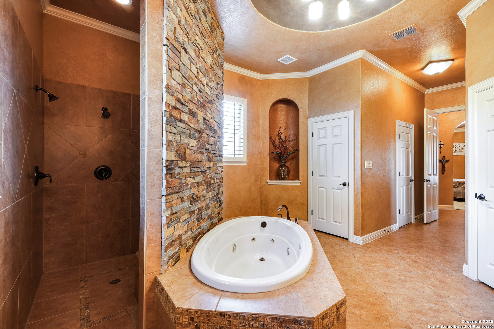 315 Santa Domingo Helotes, TX 78023 - Photo 24 of 50 a bathroom with a sink and a mirror