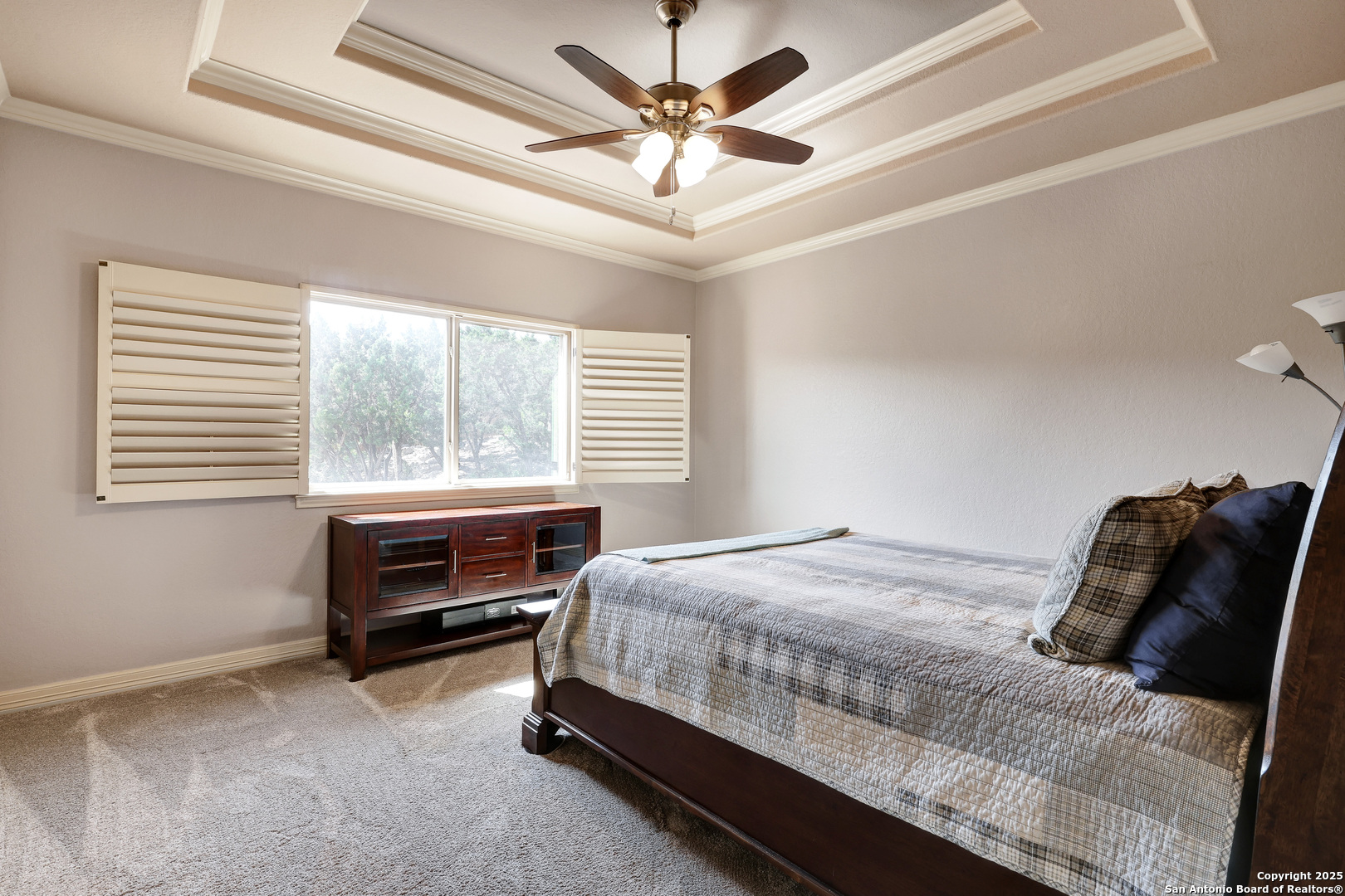 315 Santa Domingo Helotes, TX 78023 - Photo 33 of 50 a bedroom with a bed and a window