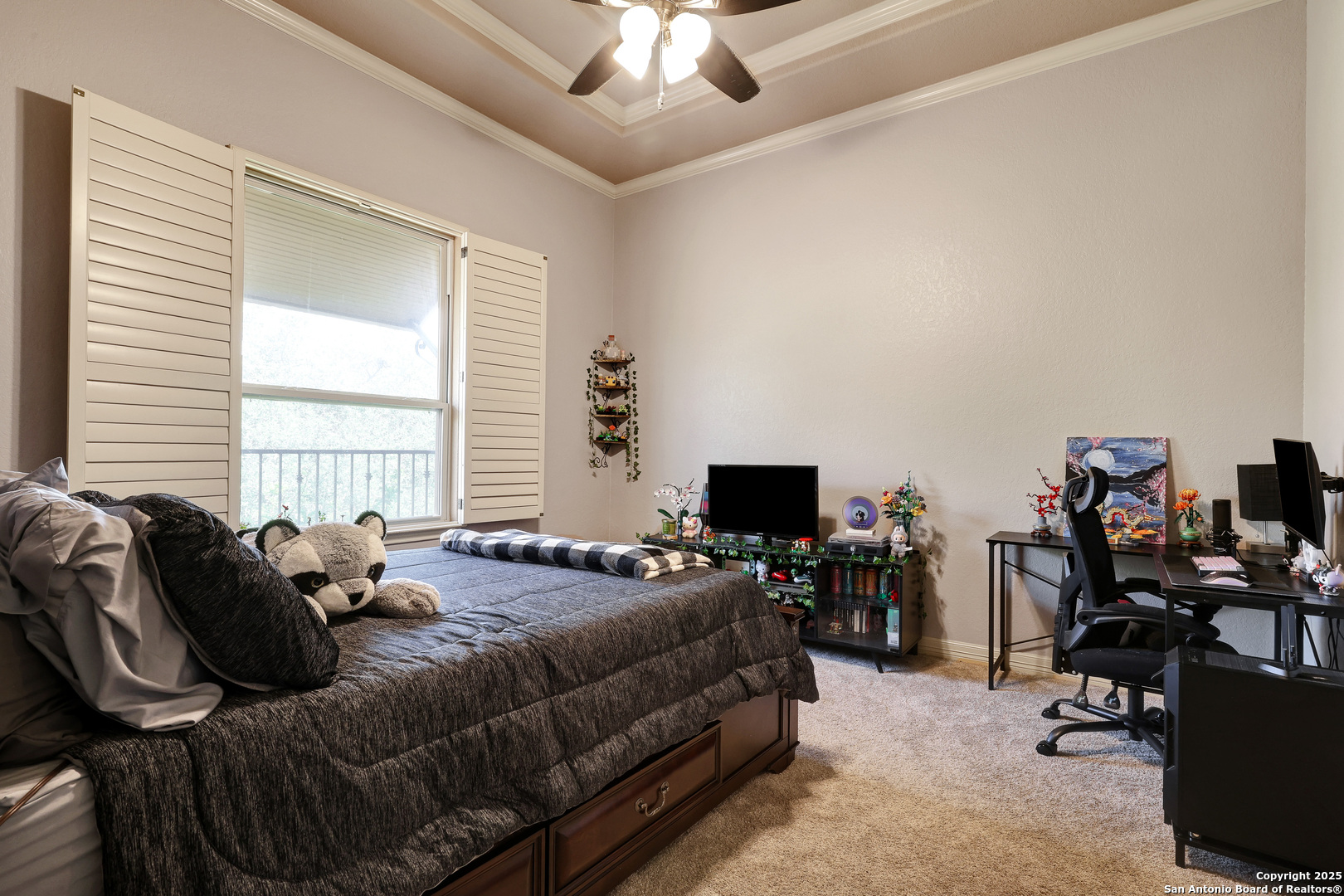 315 Santa Domingo Helotes, TX 78023 - Photo 35 of 50 a bedroom with a bed a flat screen tv and a large window