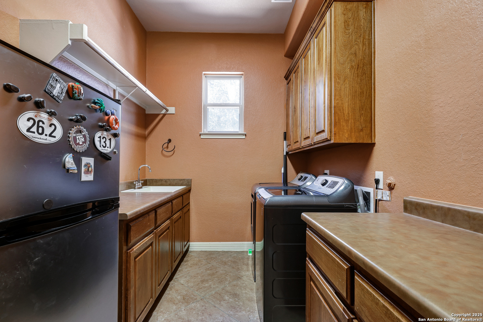 315 Santa Domingo Helotes, TX 78023 - Photo 37 of 50 a utility room with washer and dryer