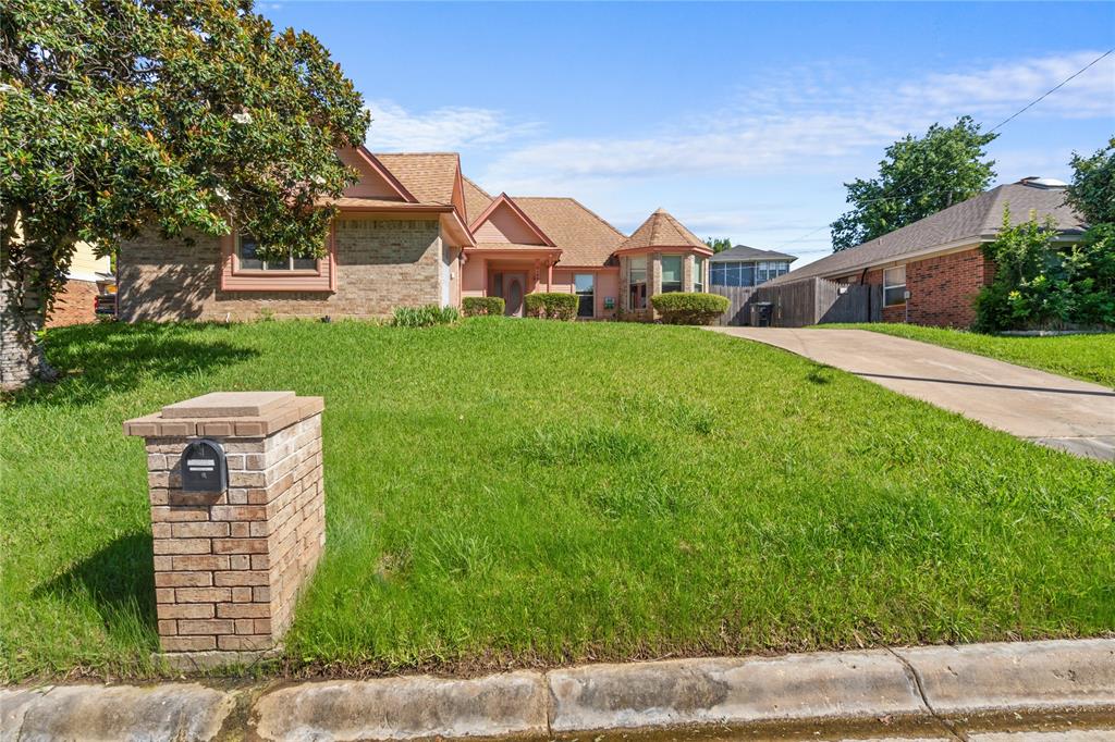 3506 Ruidoso Drive Arlington, TX 76017 - Photo 2 of 37 Brick and siding exterior featuring a round turret, covered entry, and an attached driveway