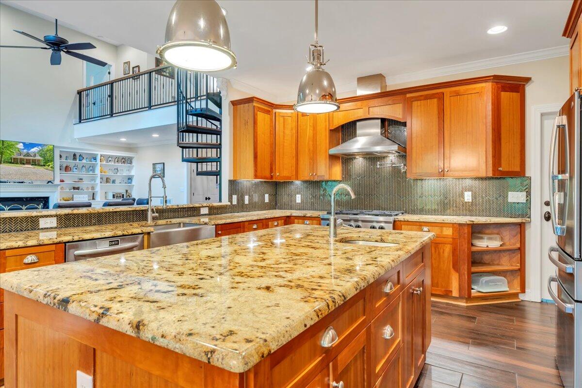 640 Flanders Road Callaway, VA 24067 - Photo 13 of 73 a kitchen with stainless steel appliances granite countertop a sink and a stove