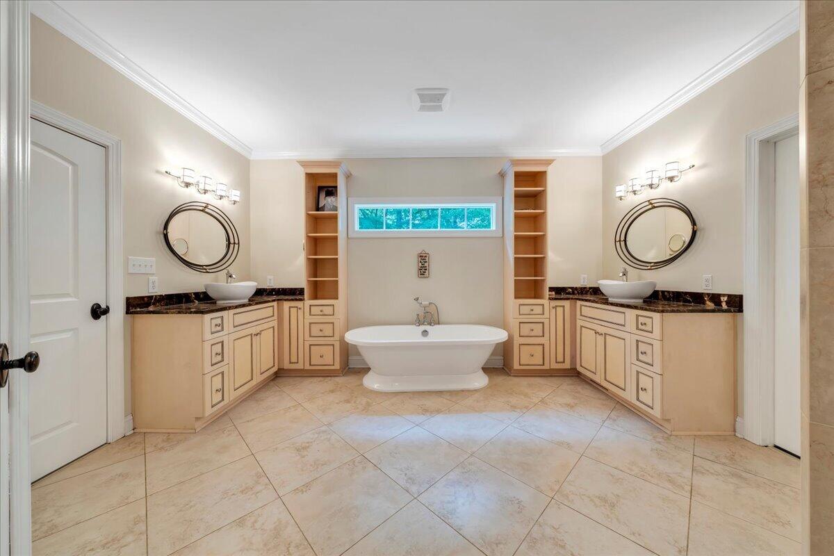 640 Flanders Road Callaway, VA 24067 - Photo 26 of 73 a bathroom with a double vanity sink mirror and toilet