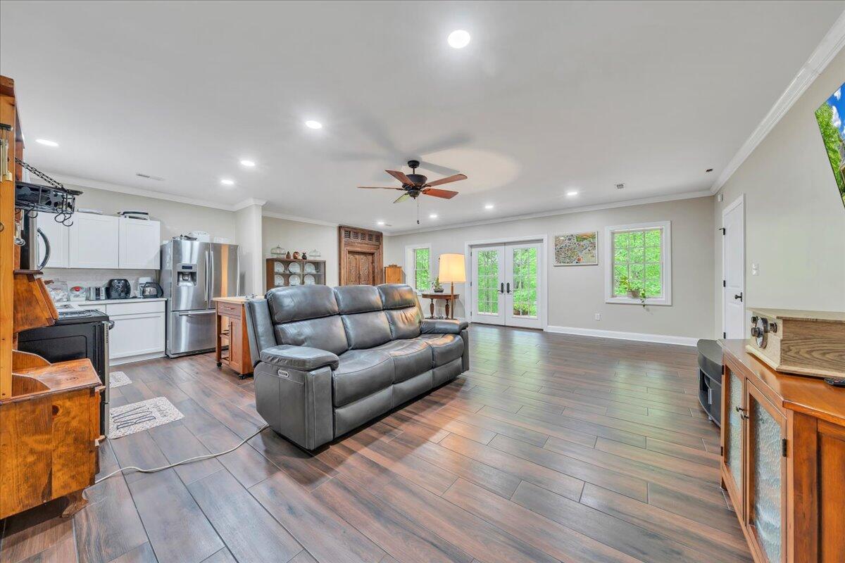 640 Flanders Road Callaway, VA 24067 - Photo 52 of 73 a living room with furniture and a wooden floor
