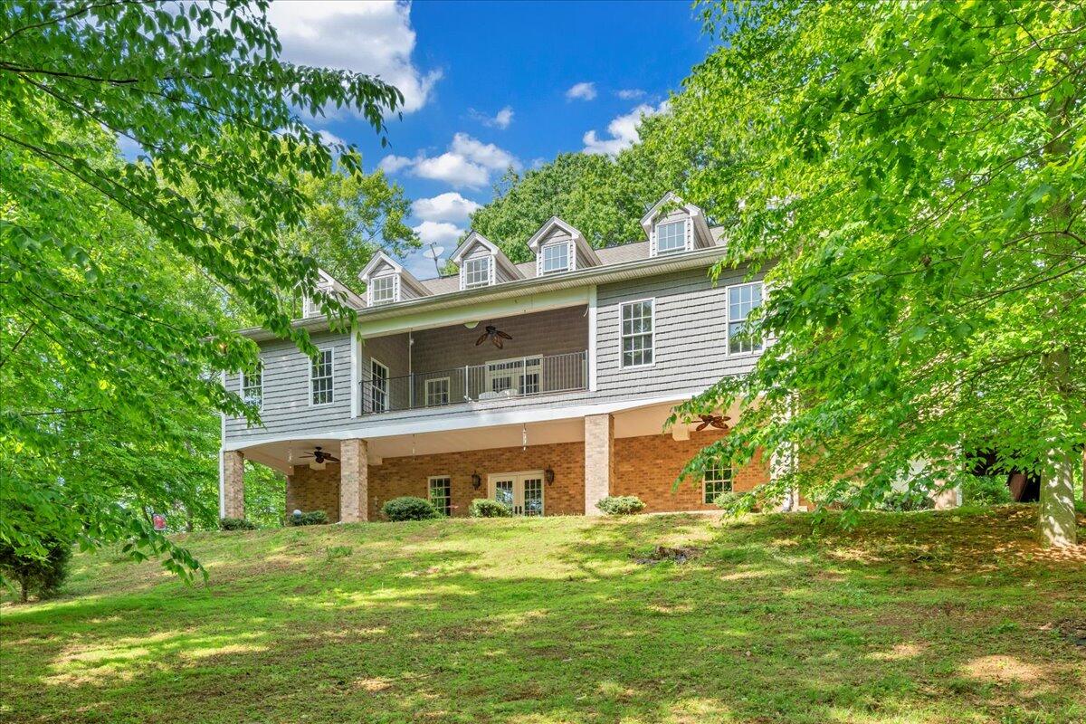 640 Flanders Road Callaway, VA 24067 - Photo 64 of 73 a front view of a house with a garden
