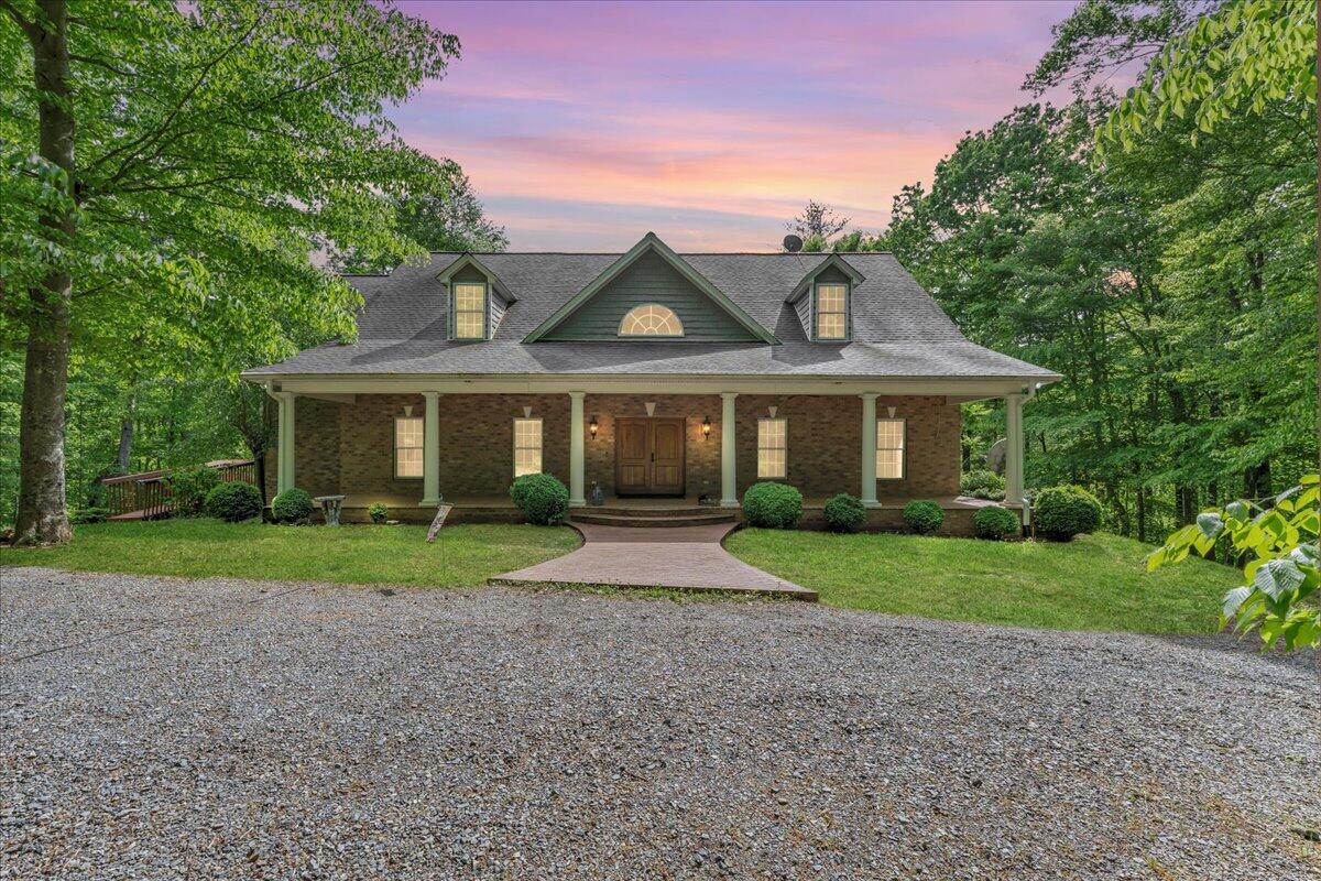 640 Flanders Road Callaway, VA 24067 - Photo 72 of 73 a front view of a house with a yard and a garage