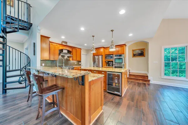 a dining room with furniture window wooden floor