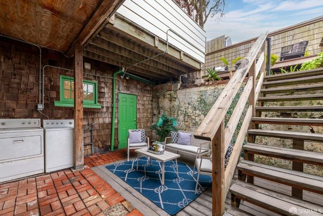 a view of yard with patio