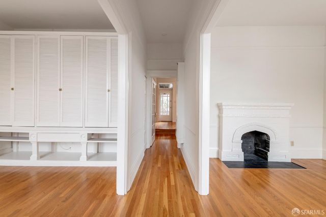 a view of a livingroom with wooden floor